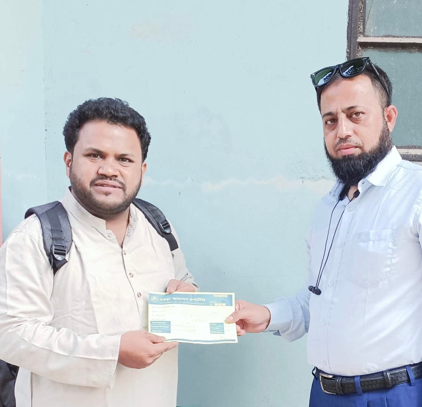 জমির শেয়ার বগুড়া Happy client of Bogura Abashon Properties after successful property purchase in Bogura